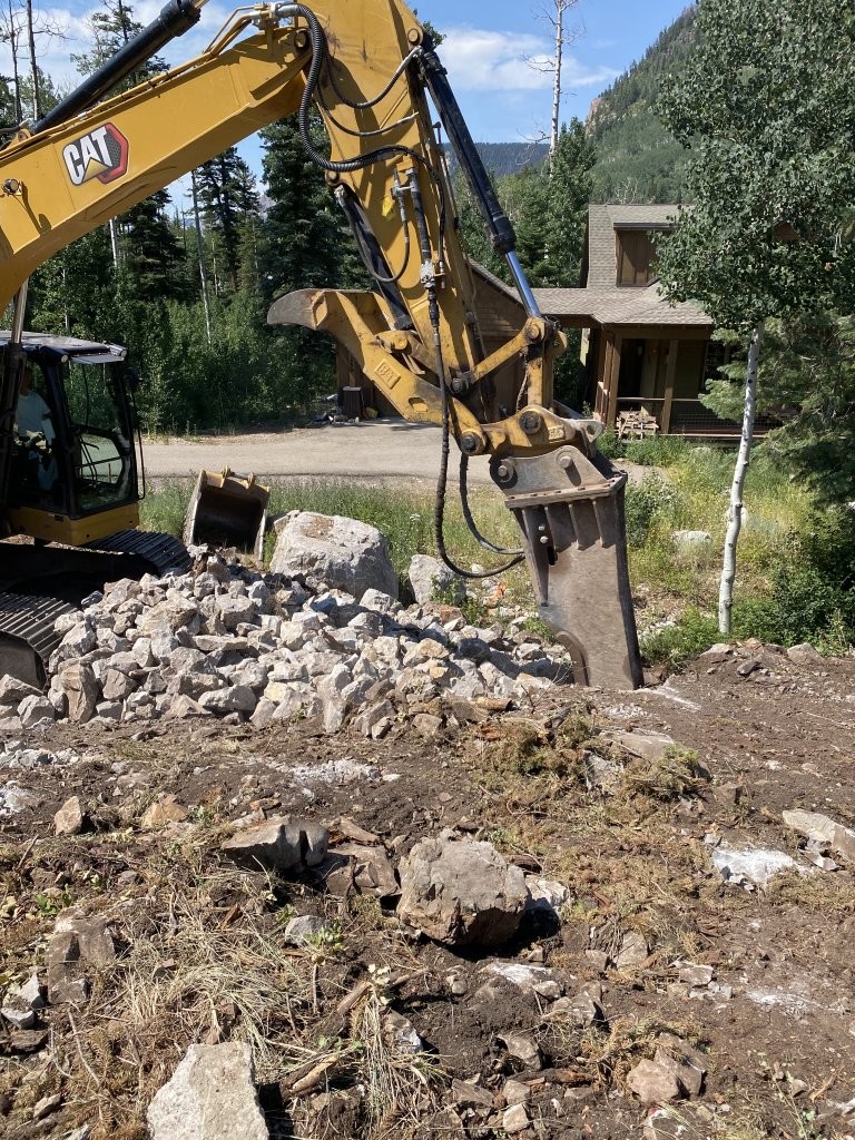 Chipping away at the rock.